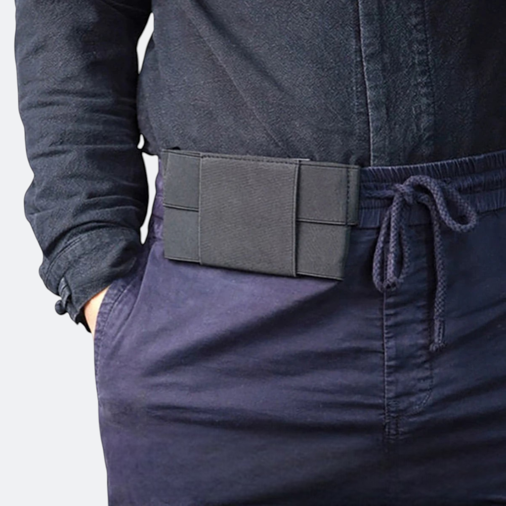 AïtaVia black secure travel waist pouch, discreet anti-theft design for passport and cash.