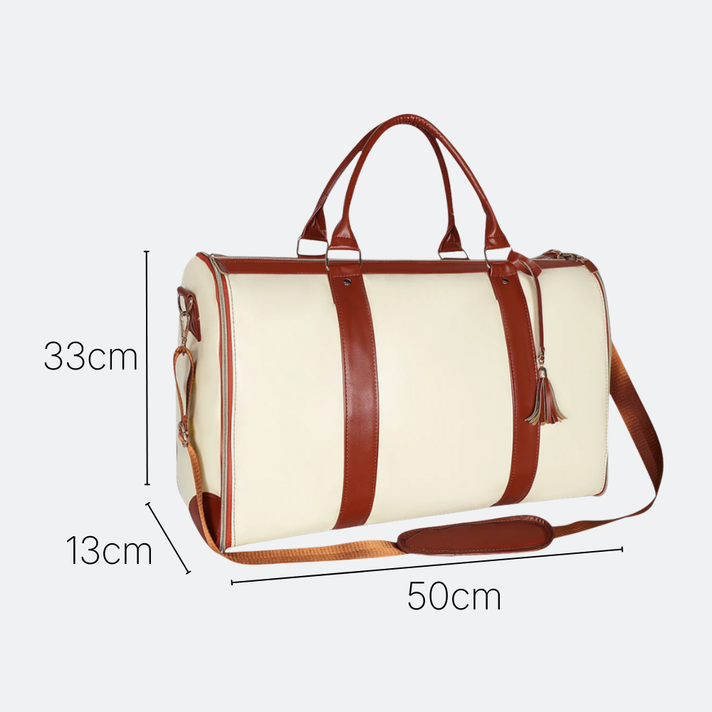 AïtaVia cream duffel bag with brown leather trim and straps, tassel detail. Ideal for travel.