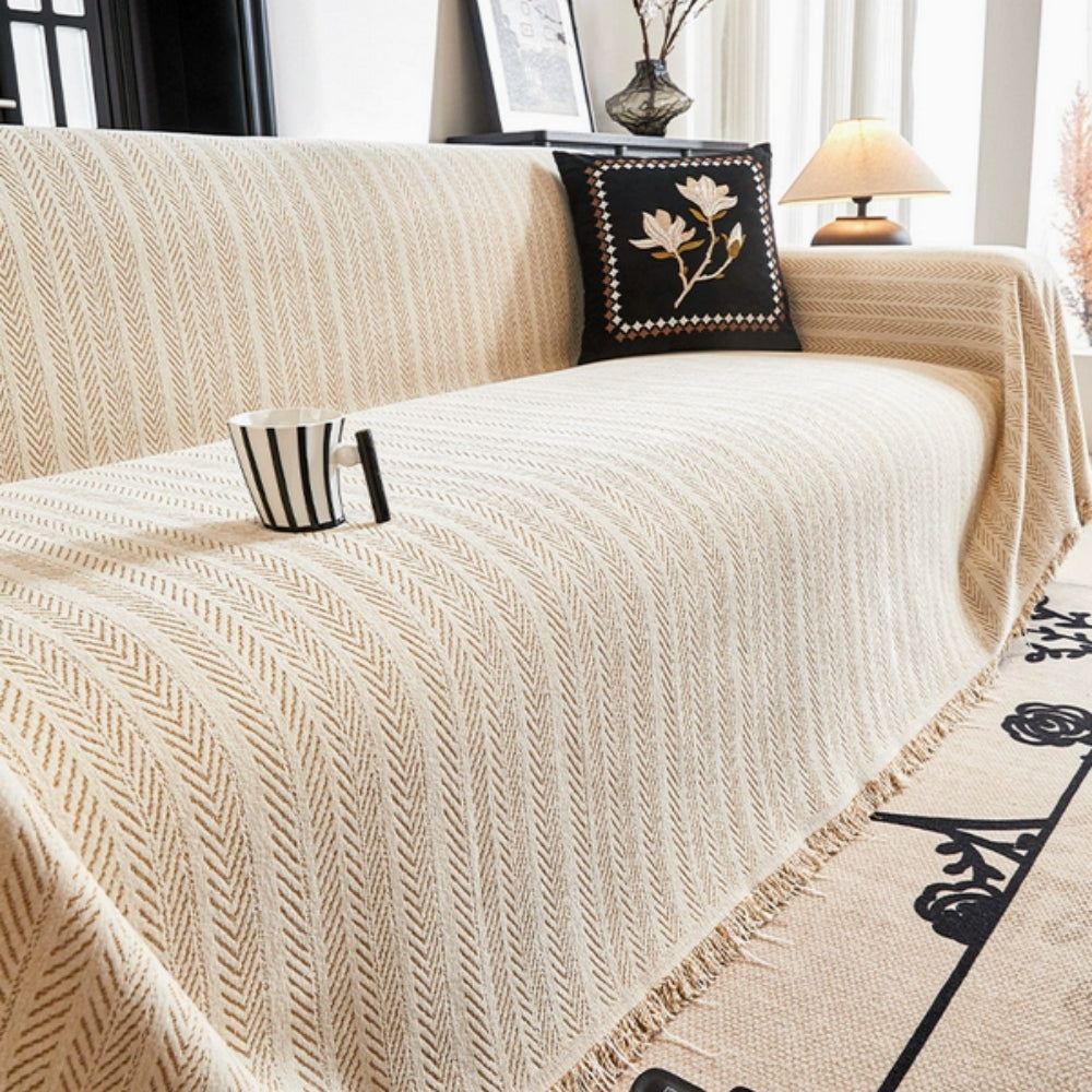 Housse de canapé en chenille à chevrons et franges à pompons