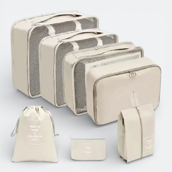 AïtaVia beige luggage organizer set with mesh fronts and handles, includes cubes, a drawstring bag, a flat pouch, and a shoe bag.