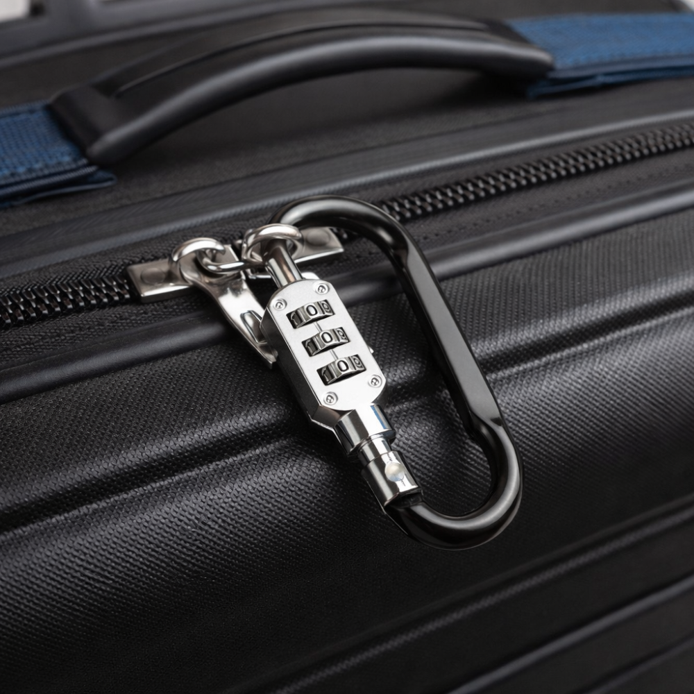 AïtaVia black carabiner luggage lock with a 3-digit combination lock securing a black suitcase zipper.