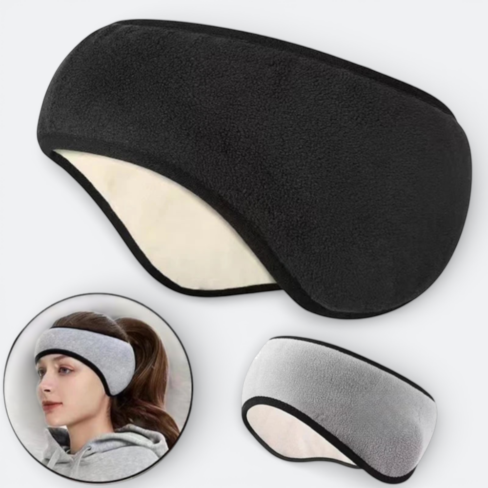 AïtaVia black fleece sleep mask with soft lining for noise reduction and light blocking during travel.