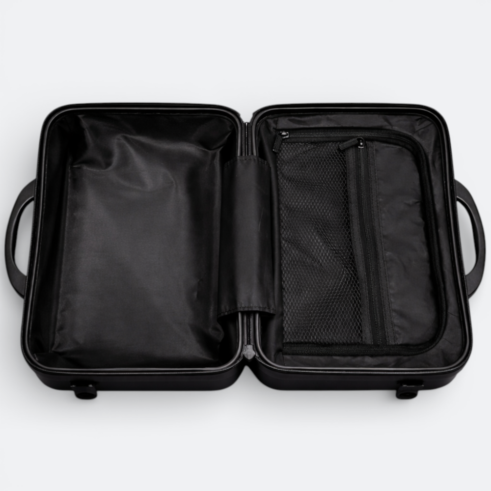 AïtaVia black hard-shell makeup vanity case with organized interior compartments and mesh pocket.