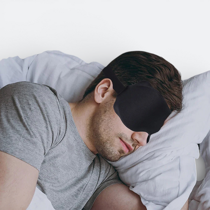 AïtaVia black padded sleep mask for comfortable travel and blocking light. Adjustable strap for a secure fit.