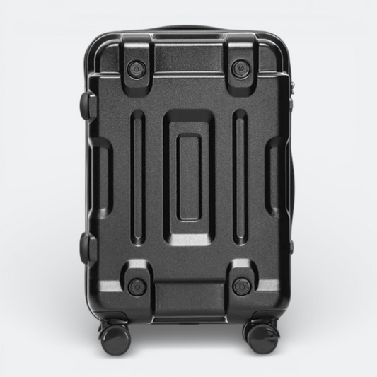 AïtaVia black hard-shell carry-on suitcase with reinforced corners and textured front panel.