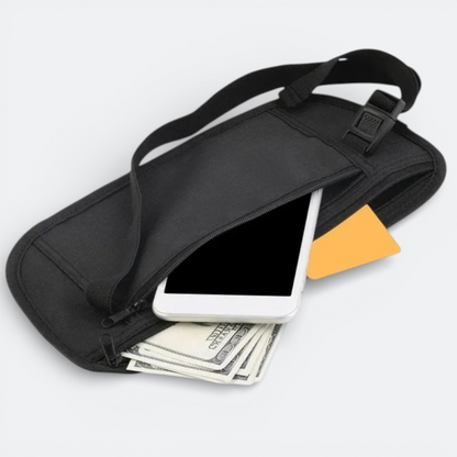 AïtaVia black travel money belt with zippered compartments holding a smartphone, cash, and a credit card.