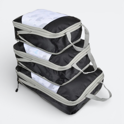 AïtaVia black and white mesh packing cubes for cabin luggage, set of 3, with handles and zippers.
