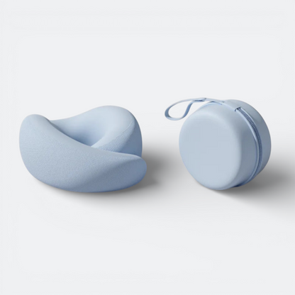 AïtaVia light blue ergonomic travel neck pillow with a compact zippered carrying case.