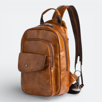 AïtaVia brown genuine leather men's backpack with multiple pockets and adjustable straps.