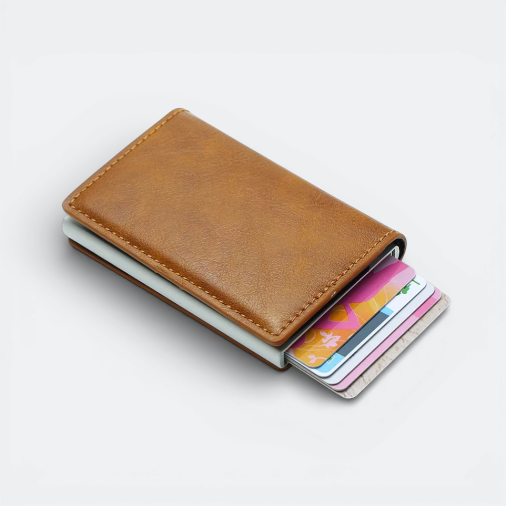AïtaVia brown faux leather RFID blocking card holder with a silver metal interior and multiple credit cards visible.