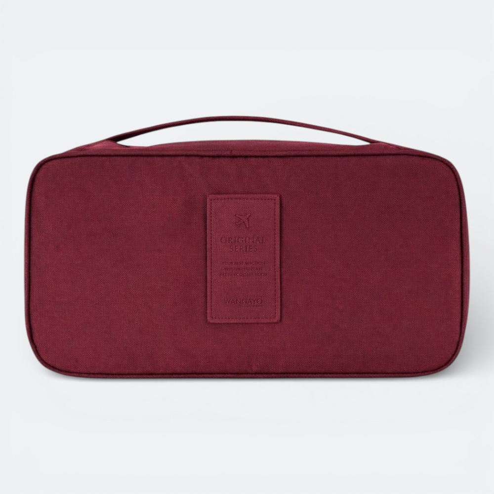 AïtaVia burgundy travel underwear organizer bag with handle and leather patch detail.