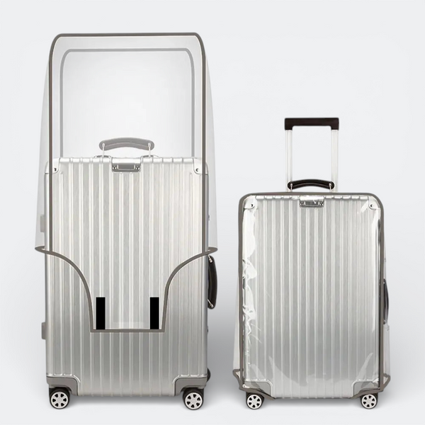 AïtaVia clear transparent suitcase cover protecting silver luggage from scratches and dirt during travel.