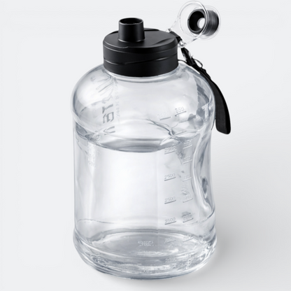 AïtaVia clear plastic water bottle with black lid and strap, marked with volume measurements.