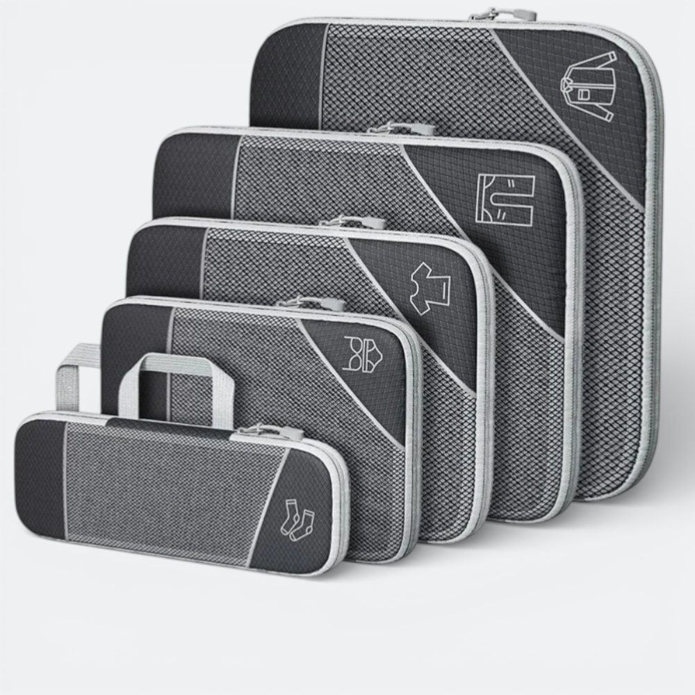 AïtaVia set of 5 grey compressible packing cubes with mesh fronts and zipper closures, featuring clothing icons.