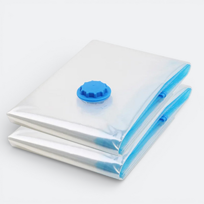 AïtaVia clear plastic compression bags with blue valves and seals, ideal for travel clothing organization.