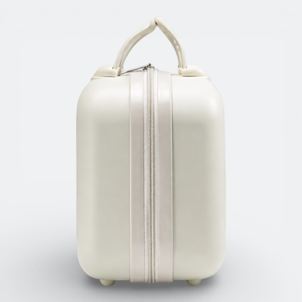 AïtaVia pale cream hard-shell cosmetic case with a central zipper and top handle. Ideal for travel and makeup organization.
