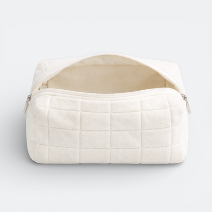 AïtaVia cream plush quilted makeup bag with zipper closure, perfect for travel and daily organization.