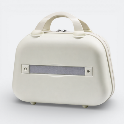 AïtaVia cream vanity case with a grey elastic band and silver zipper. Features a top handle and four small feet.