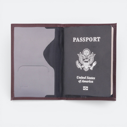 AïtaVia dark brown textured leather passport holder with a US passport inside.