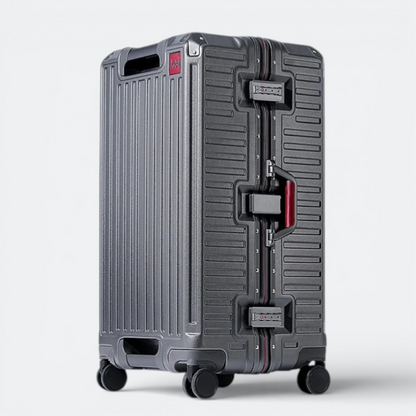 AïtaVia dark grey aluminium suitcase with red accents and TSA locks. Features a ribbed texture and sturdy frame.