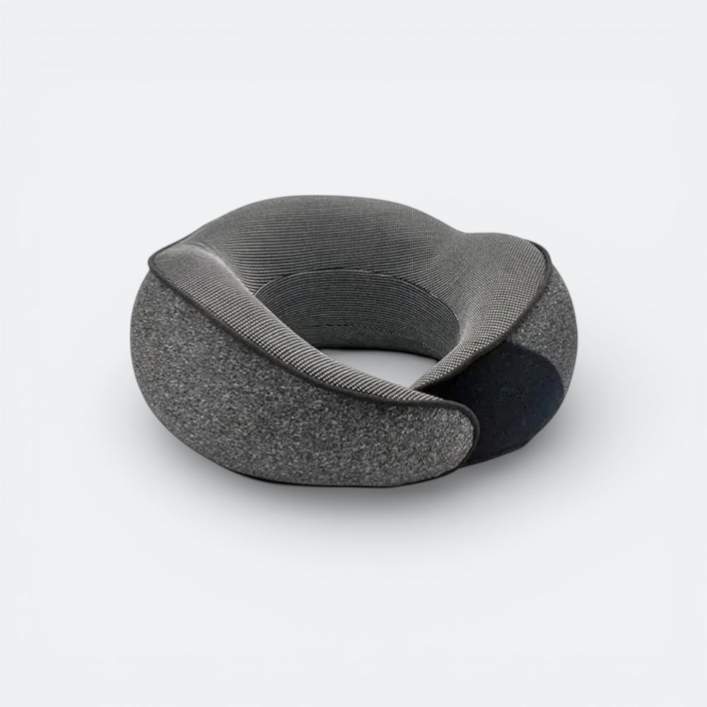 AïtaVia grey ergonomic travel neck pillow with textured fabric and a contoured design for comfortable support.