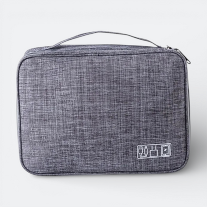 AïtaVia grey fabric travel organizer case for charging cables and accessories. Features a handle and zippered closure.