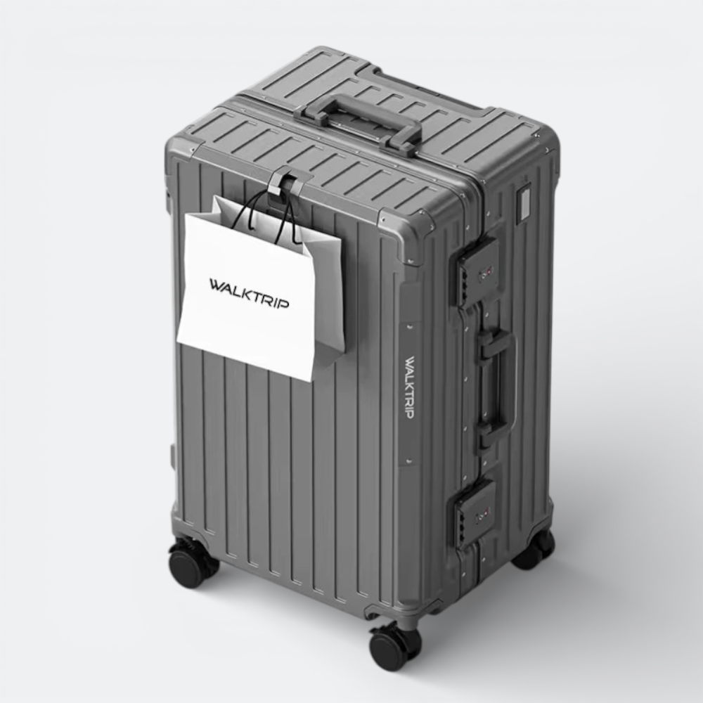 AïtaVia grey hard-shell large suitcase with spinner wheels and TSA locks, ideal for travel.