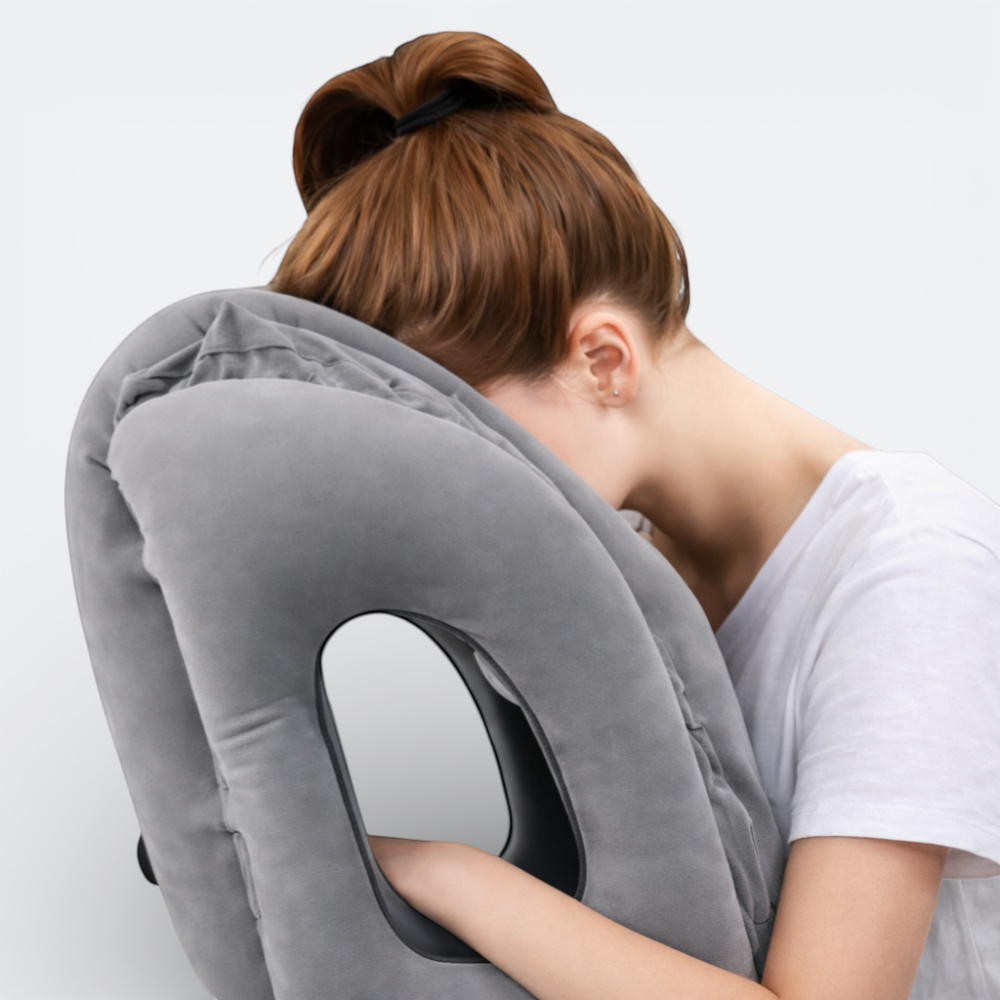 AïtaVia grey inflatable travel pillow with ergonomic support for neck and head, ideal for planes, trains, and cars.