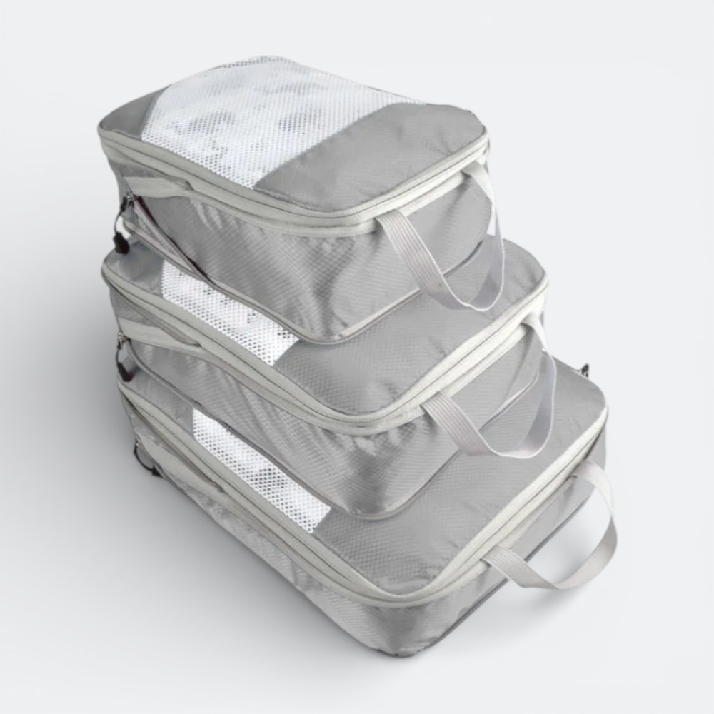AïtaVia grey packing cubes set of 3 with mesh tops and handles for cabin luggage organization.