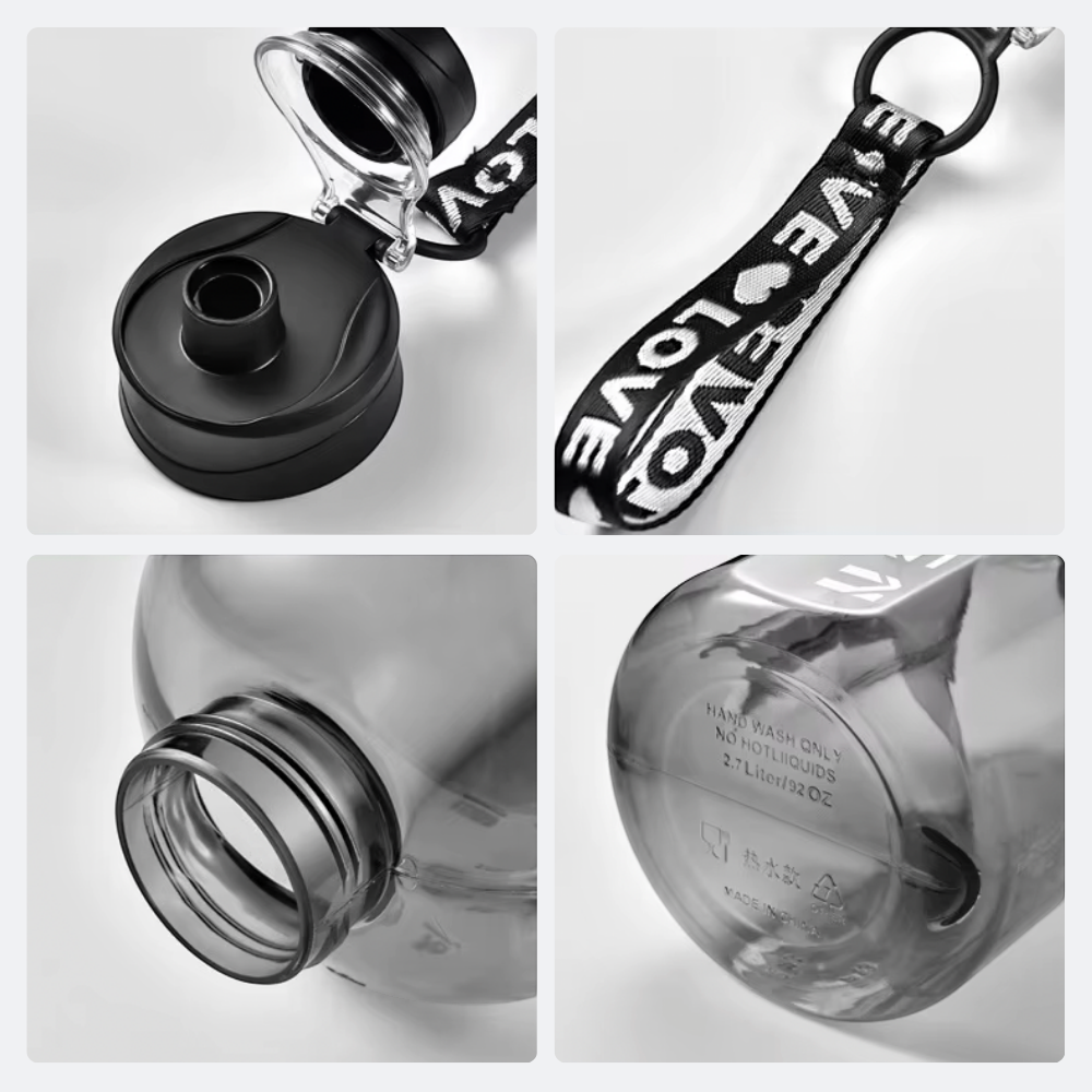 AïtaVia grey translucent plastic water bottle with black lid and 'LOVE' strap, 2.7L capacity.
