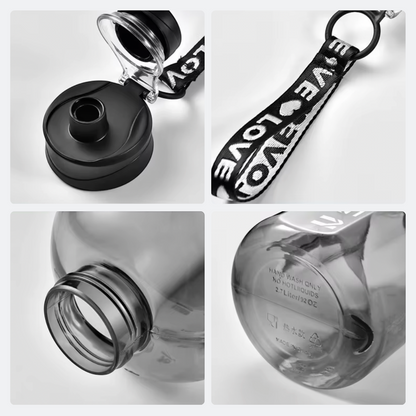 AïtaVia grey translucent plastic water bottle with black lid and 'LOVE' strap, 2.7L capacity.