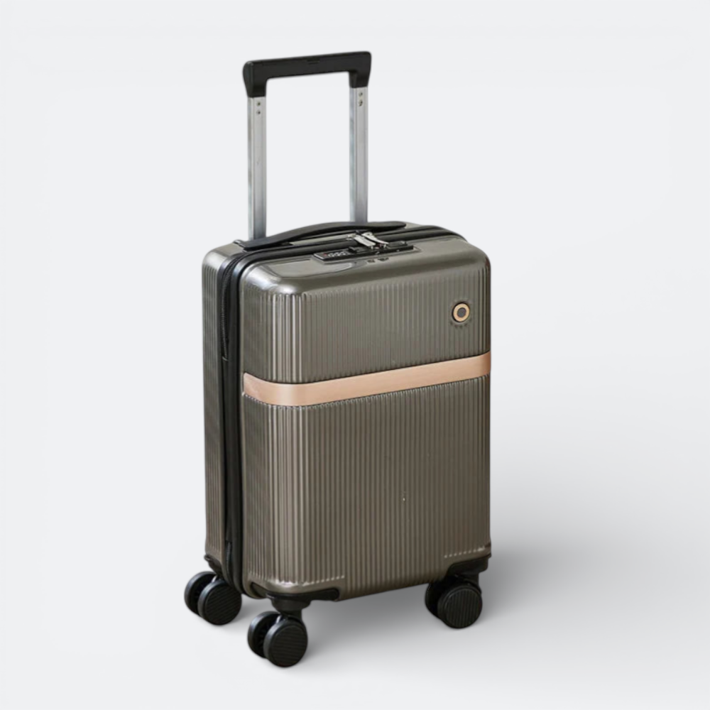 AïtaVia grey ribbed carry-on suitcase with removable wheels and a rose gold accent band.
