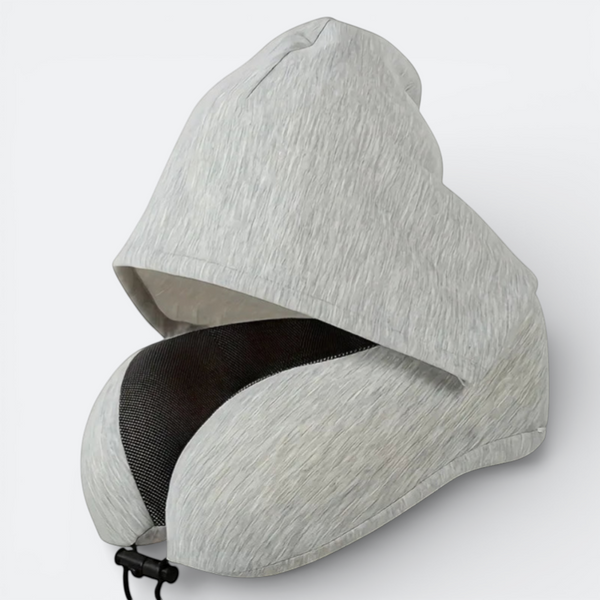 AïtaVia light grey travel neck pillow with integrated hood for privacy and comfort during journeys.