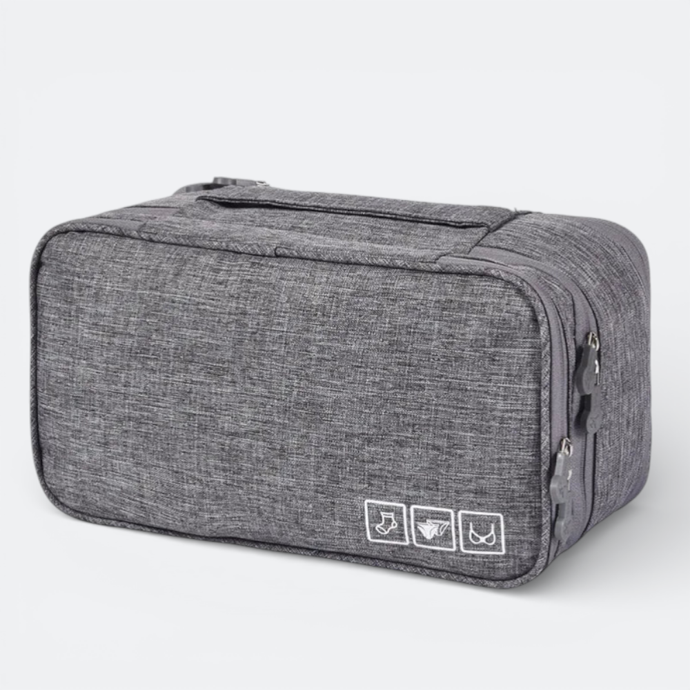 AïtaVia grey heathered fabric travel underwear organizer bag with zipper closure and interior compartments.