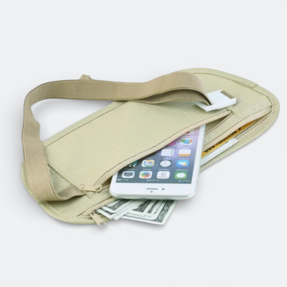 AïtaVia beige invisible travel money belt with zippered pockets holding a smartphone, cash, and cards.