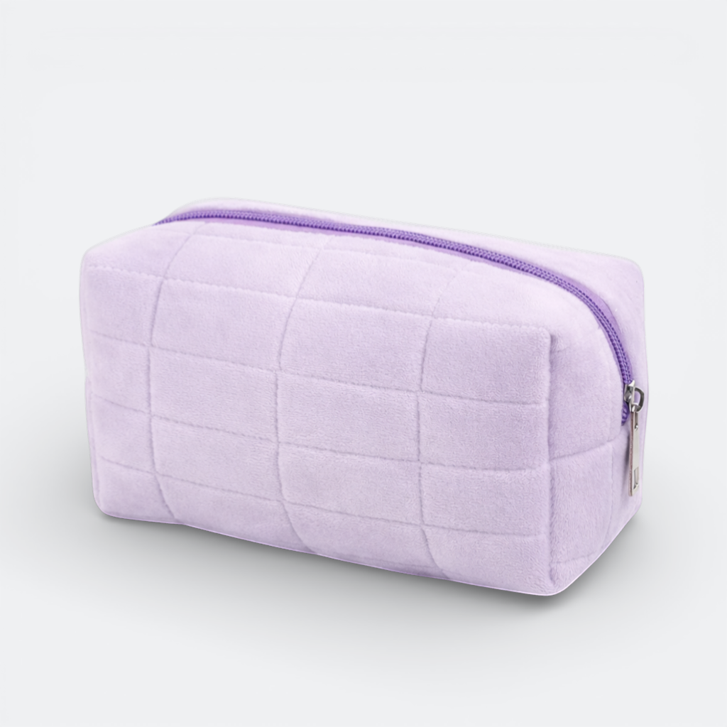 AïtaVia lavender plush quilted makeup bag with purple zipper. Soft, practical, and stylish for travel or daily use.