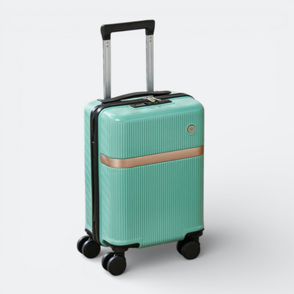 AïtaVia mint green hard-shell suitcase with removable wheels and rose gold accent band.