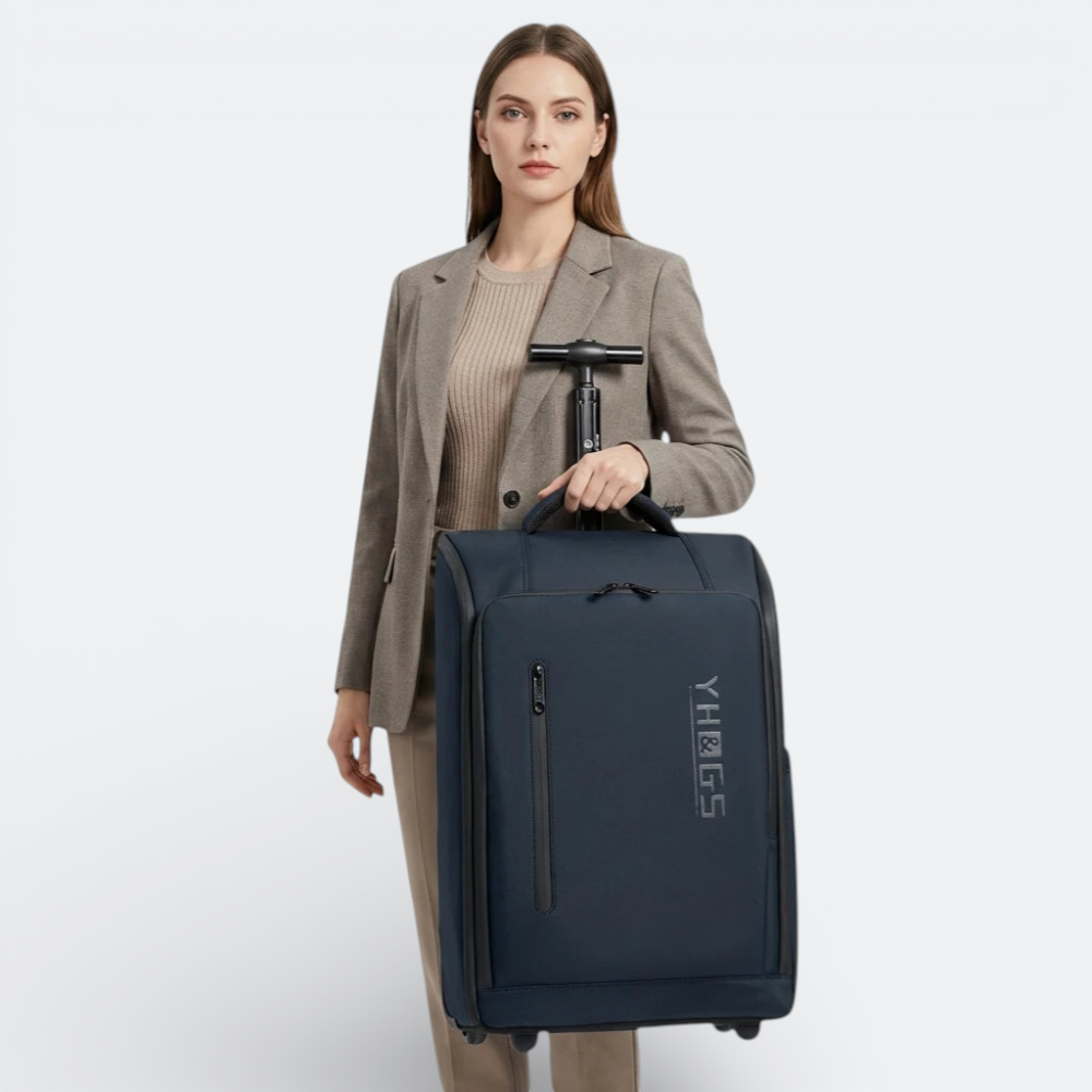 AïtaVia navy blue cabin-sized rolling backpack with retractable handle and front zipper pocket.