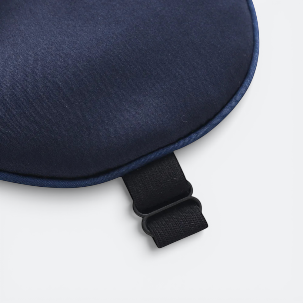 AïtaVia navy blue silk sleep mask with adjustable strap for travel and comfortable sleep.