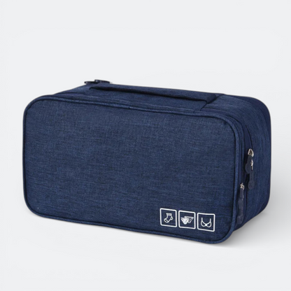 AïtaVia navy blue travel underwear organizer bag with white icons for socks, bras, and underwear.