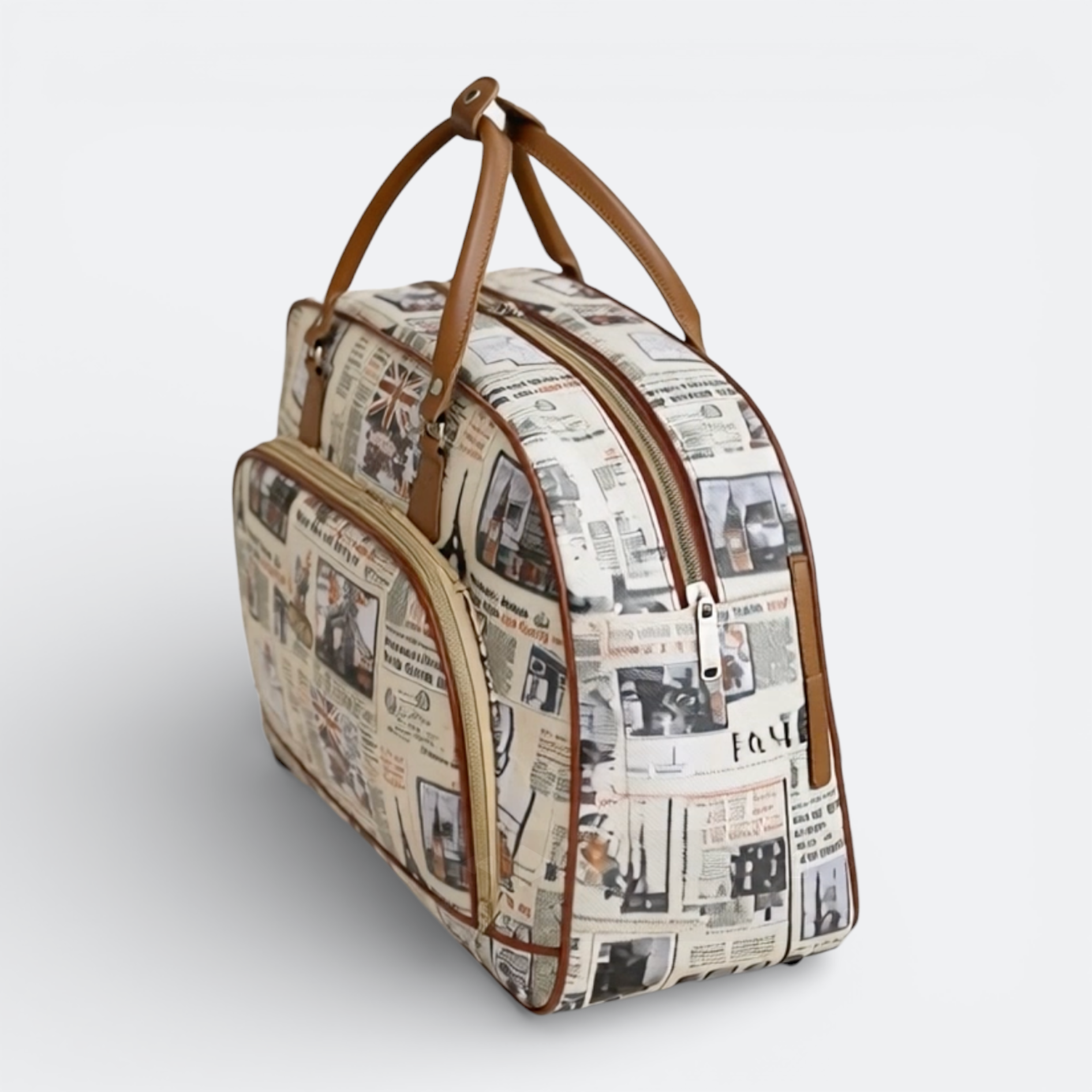 AïtaVia cream travel duffel bag with a newspaper print and brown leather trim. Features Union Jack and city skyline motifs.