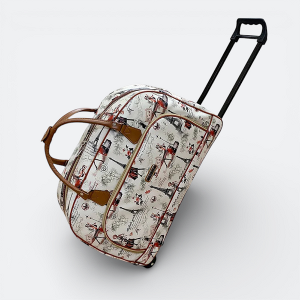 AïtaVia cream travel bag with a Parisian print, featuring Eiffel Tower motifs and red accents. Includes brown leather handles and a retractable black pull handle.