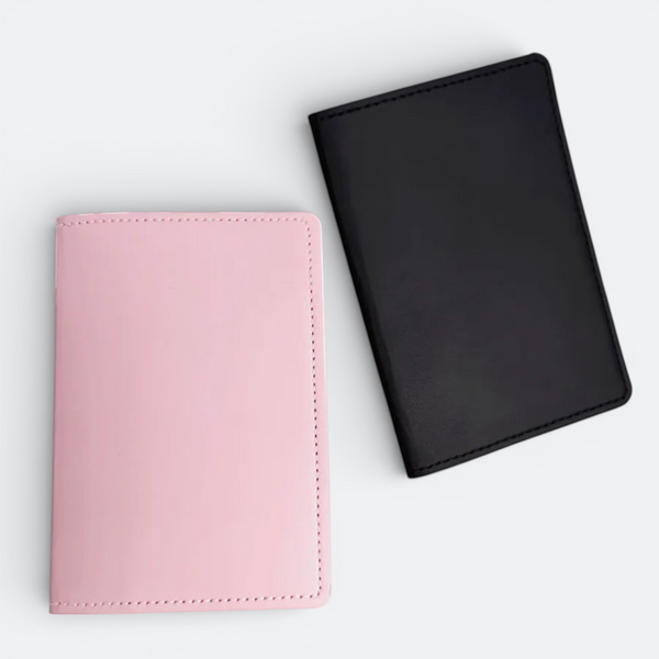 AïtaVia pink and black passport holders made of smooth leather. Practical travel accessories for organizing documents.