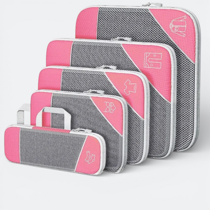 AïtaVia set of 5 pink and grey mesh compressible packing cubes with clothing icons.