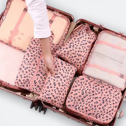 AïtaVia pink leopard print luggage organizer set with mesh panels and zippers, neatly packed in a suitcase.