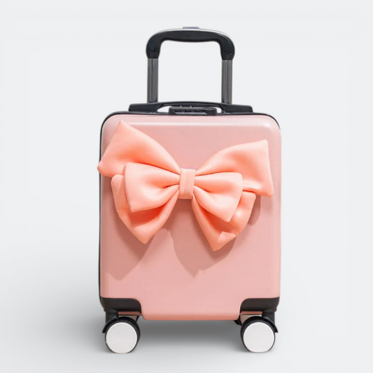 AïtaVia pink mini suitcase with a large satin bow, perfect for short trips and travel.