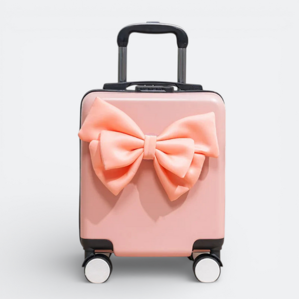 AïtaVia pink mini suitcase with a large satin bow, perfect for short trips and travel.