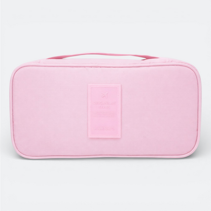 AïtaVia pink travel underwear organizer bag with handle and embossed patch.