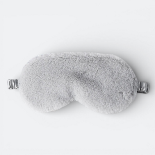 AïtaVia grey plush sleep mask with satin elastic strap, perfect for travel and blocking light for ultimate comfort.