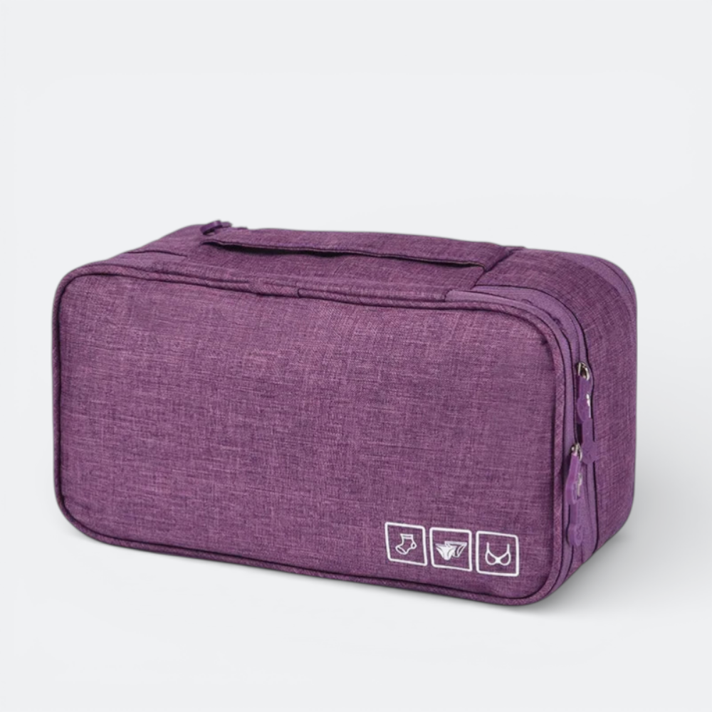 AïtaVia purple travel underwear organizer bag with zippered closure and interior compartments.